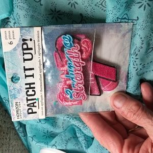 Patch it Up Kit with Breast Cancer..Patches. It's bright Pink with Ribbons, etc.